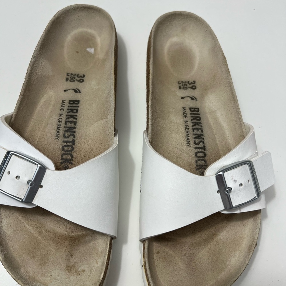 Birkenstock White Slide Sandals with Silver Buckle